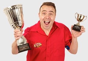 Silly Scott with trophy for childrens entertainer of the year